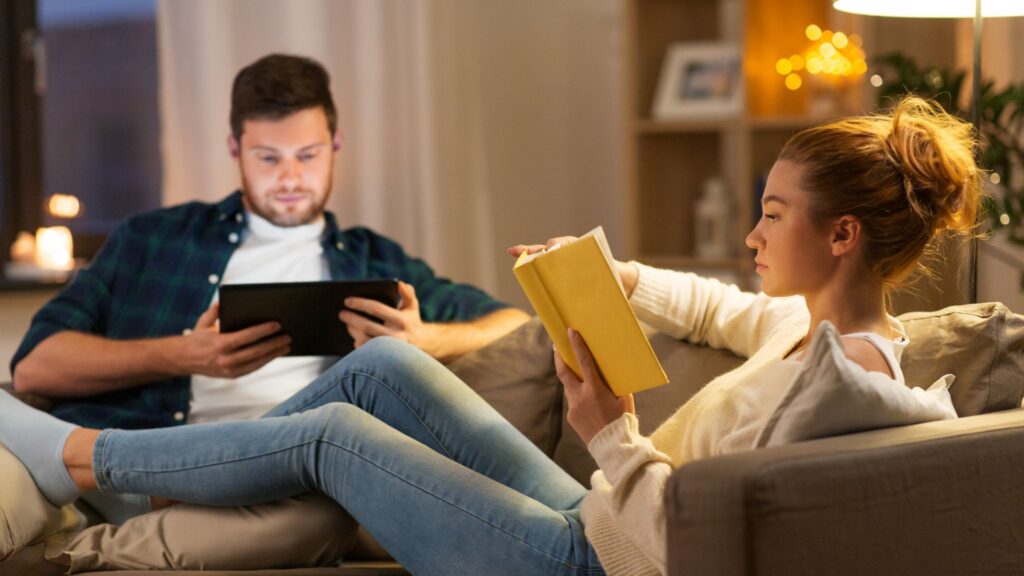 couple reading on couch
