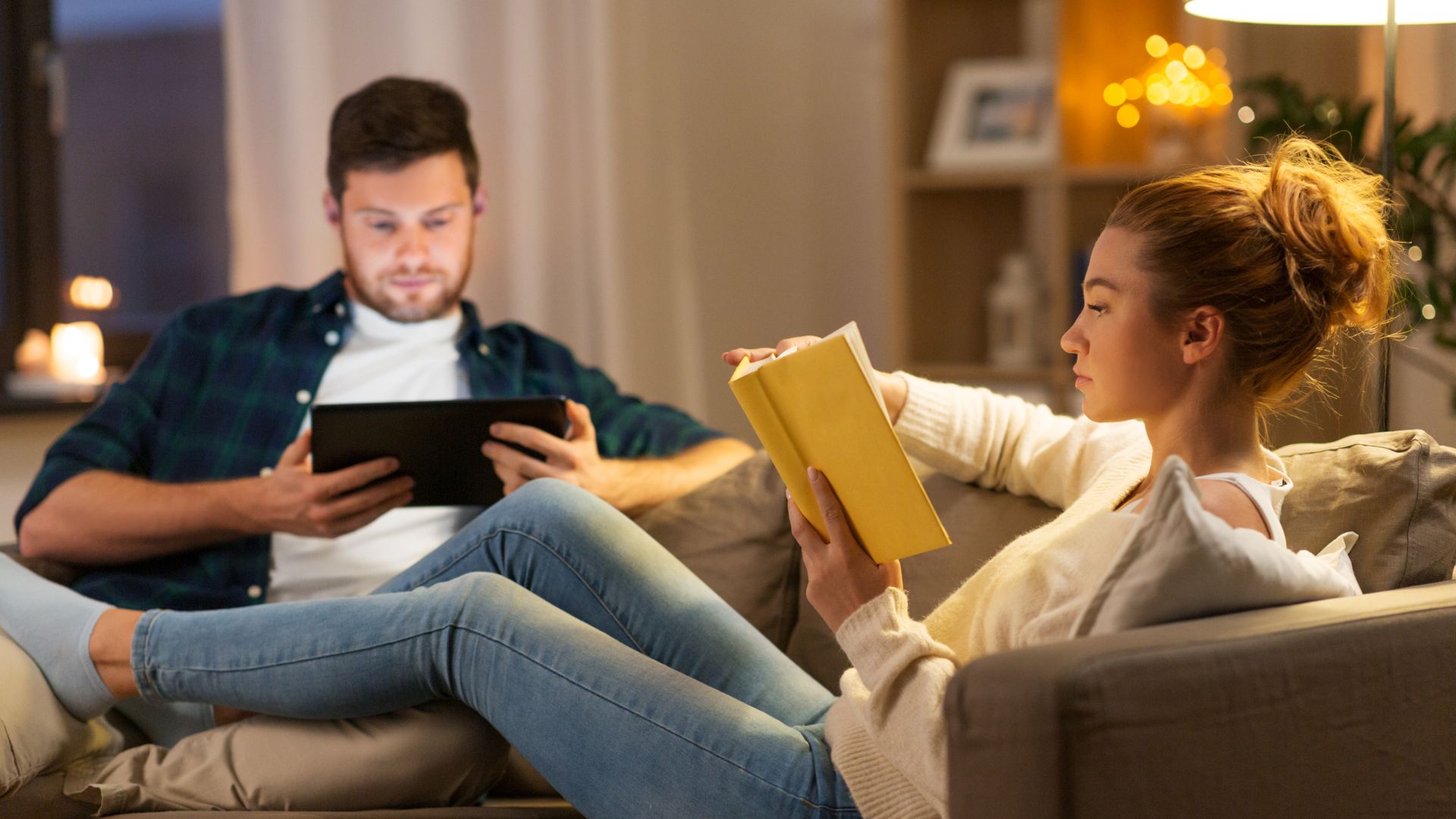 couple reading on couch
