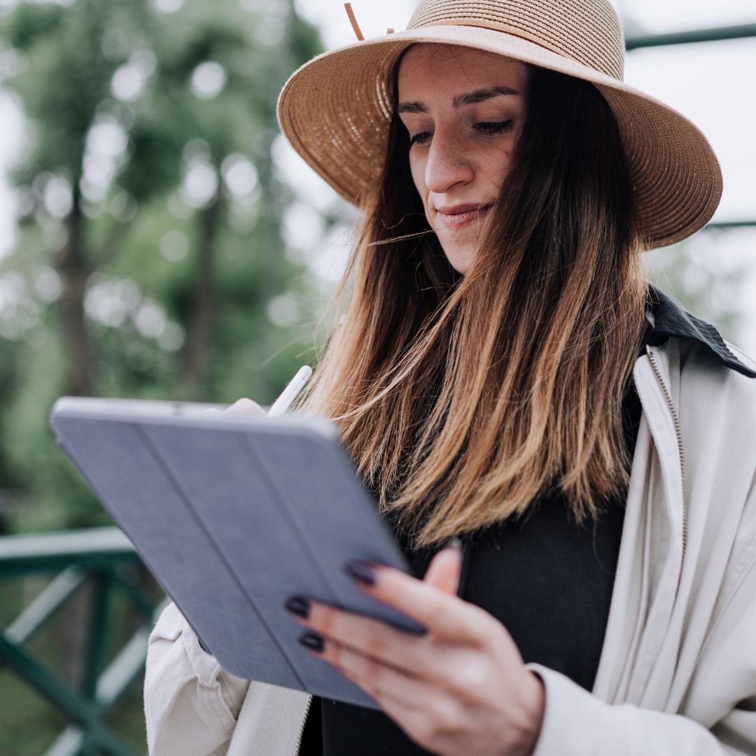 woman researching on a tablet